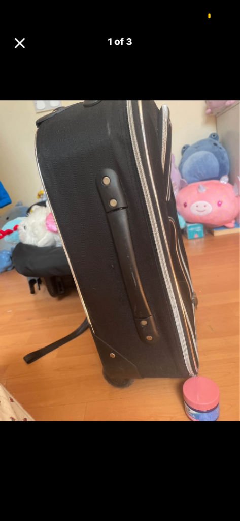 Small Black Suitcase on Wheels – Good Condition