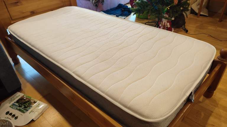 Pine single bed with 6 month old mattress.