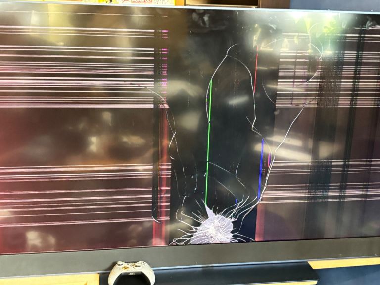 Broken 65” ocean blue sky glass tv