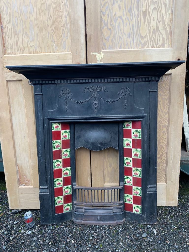 Original large Victorian cast iron tiled fireplace 