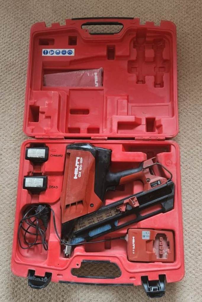 Hilti GX 90-WF nail gun, batteries, charger and box.
