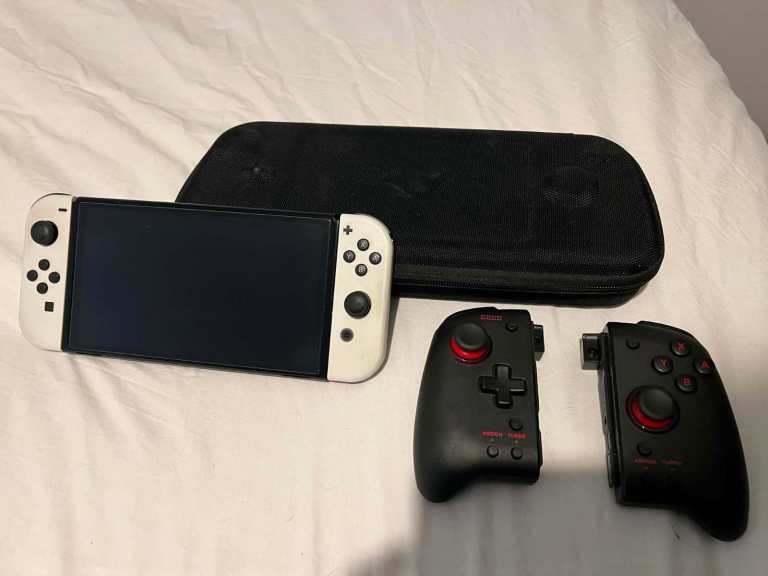 Nintendo Switch OLED + extras