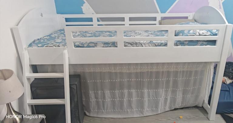 Kid’s bed with storage underneath 