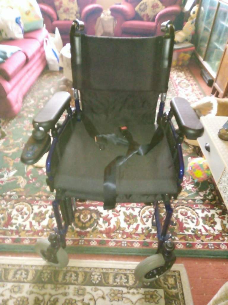 Electric Wheelchair - Blue Frame, Black Seating, Good Condition