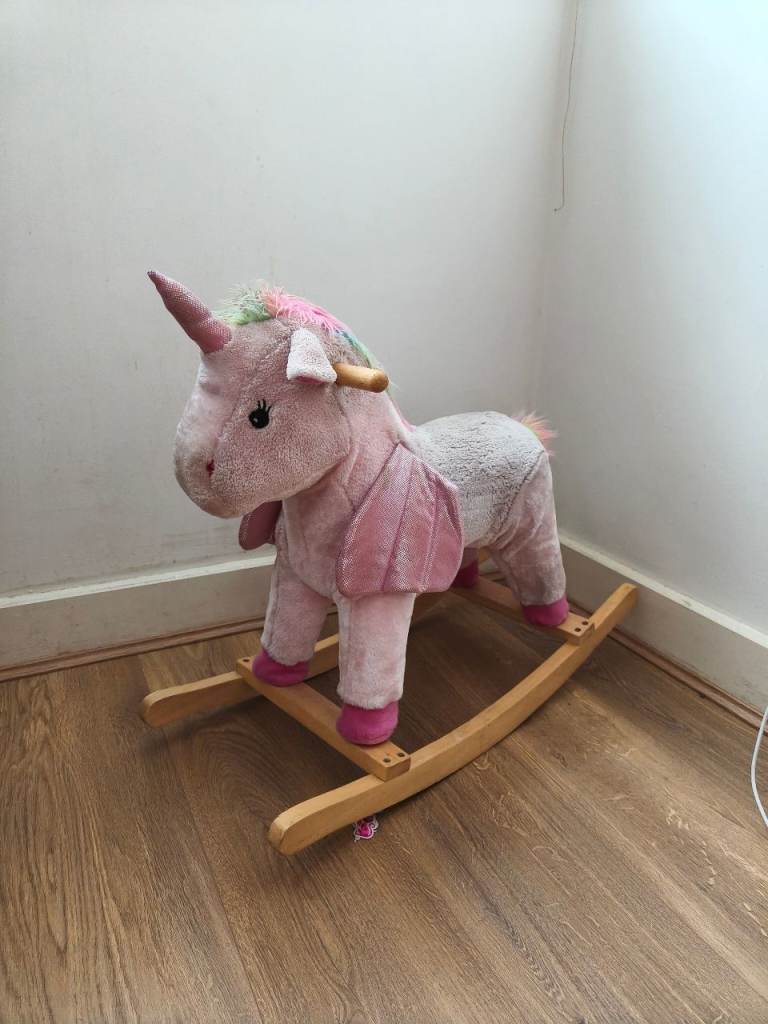 Unicorn rainbow rocking horse 
