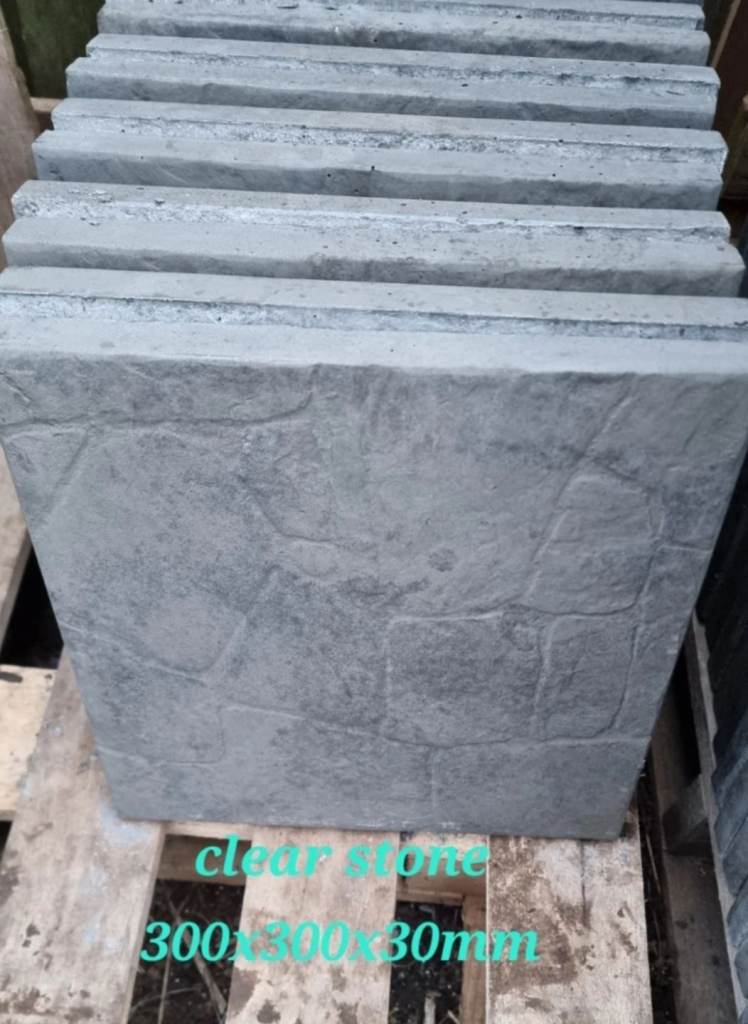 30cm x 30cm grey paving slabs