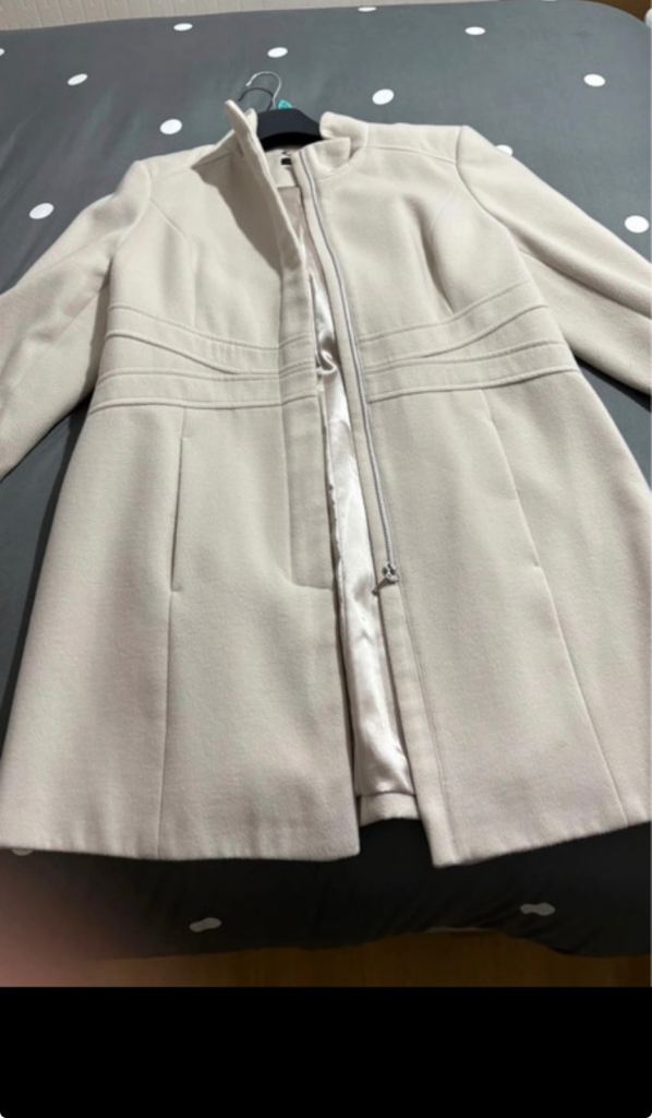Knee length cream coat 