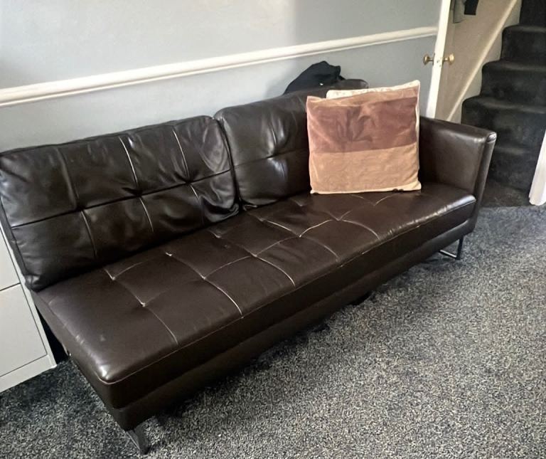 Dark brown 2 piece or L shaped sofa 