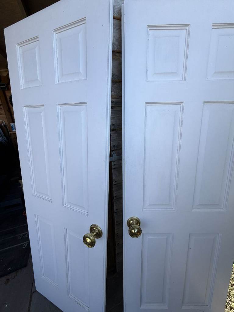 Pair of White Internal Doors with Brass Handles
