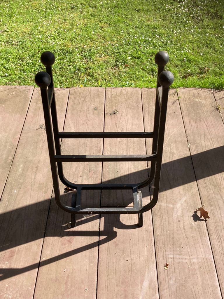 Black metal log stand 