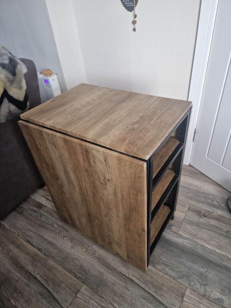 Gateleg table with storage shelves