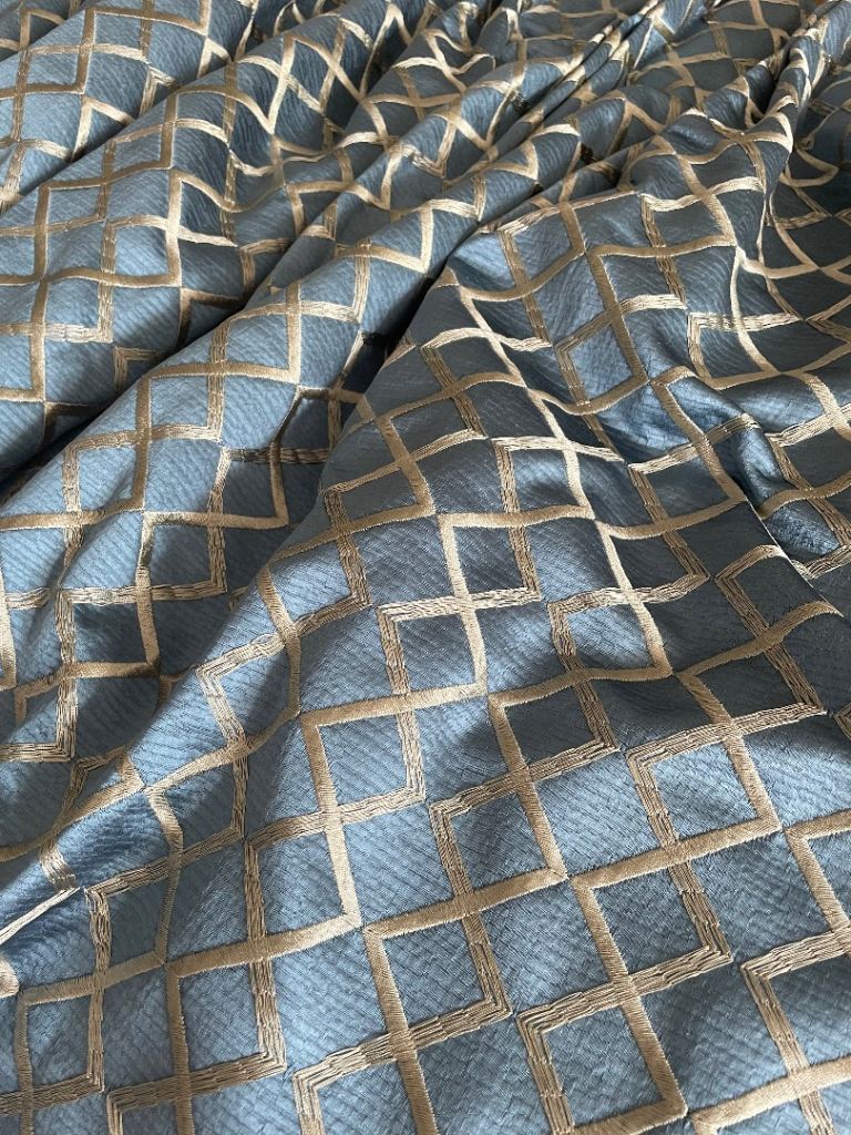 Set of curtains in blue grey
