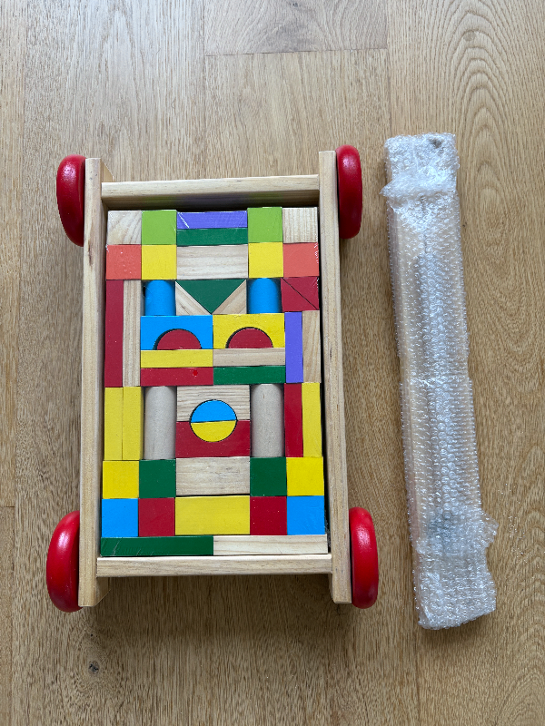 New wooden walker for babies and toddlers, with 53 bricks