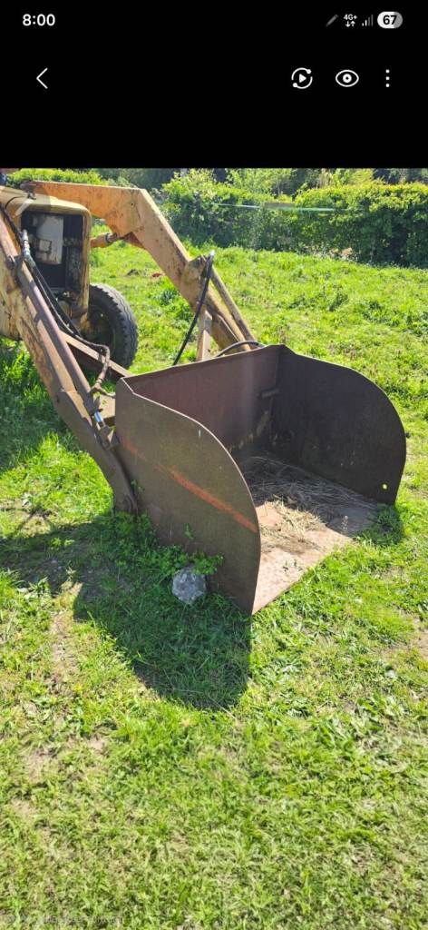 Tractor front loader and spike 