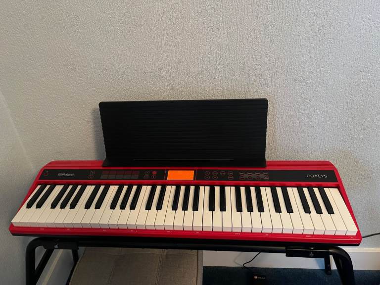Roland Go Keyboard In mint Condition + Roland Music Stand.