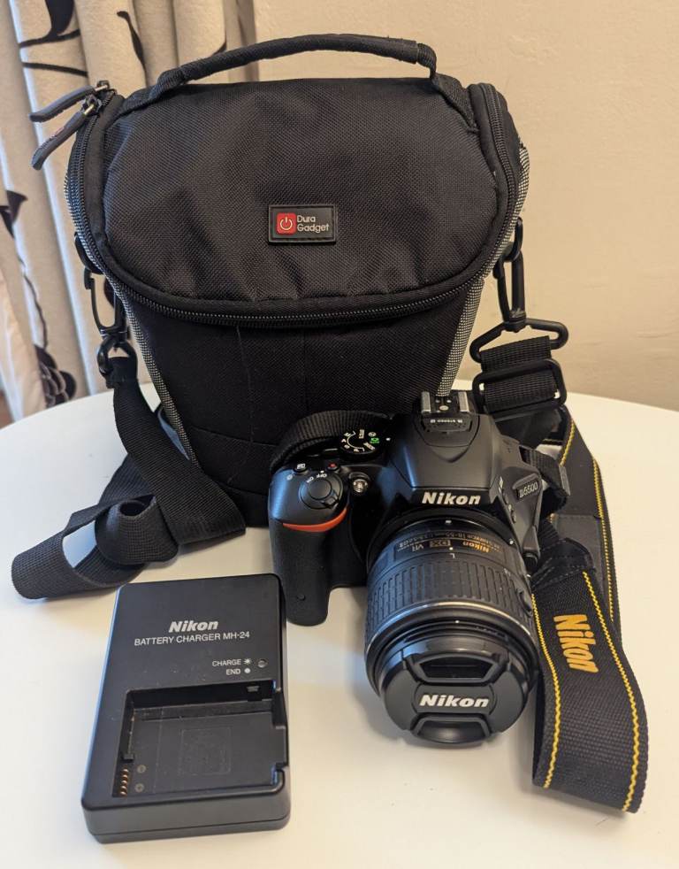 Nikon D5500 DSLR Camera with Lens, Charger, and Bag