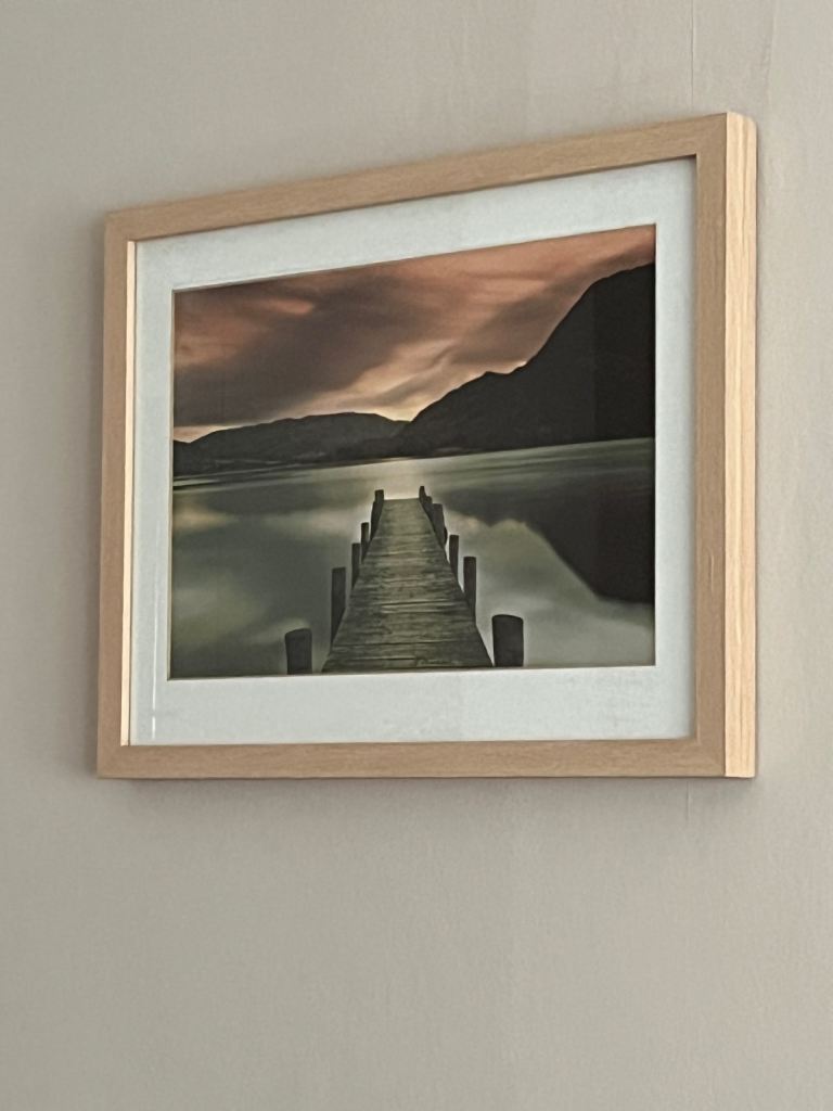Scenic picture of a jetty over a lake