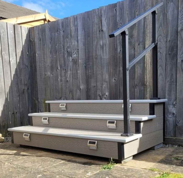 Grey and black caravan steps