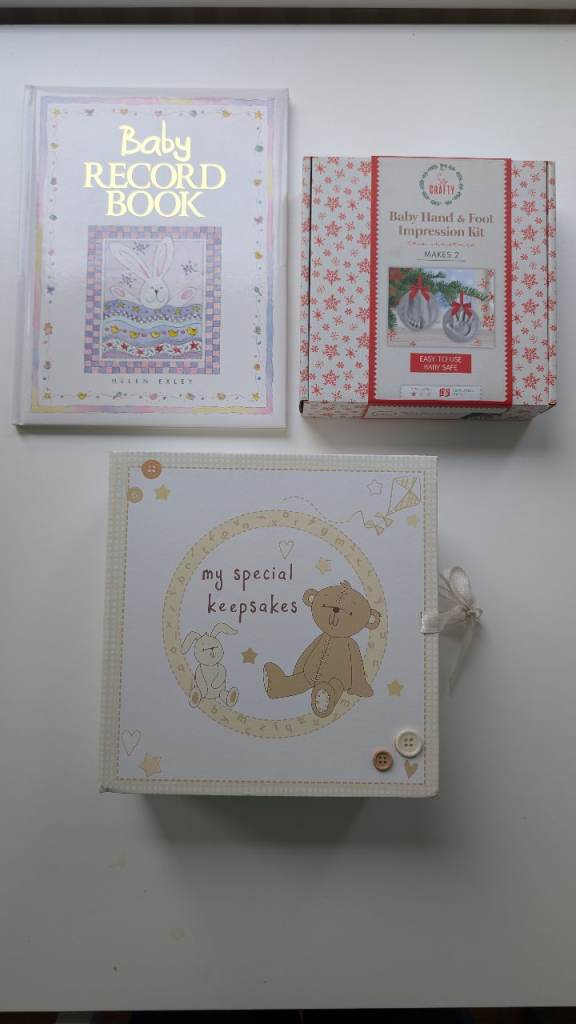 Baby record book and Keepsakes' box. Also includes a 'Baby Hand & Foot Impression Kit'. 