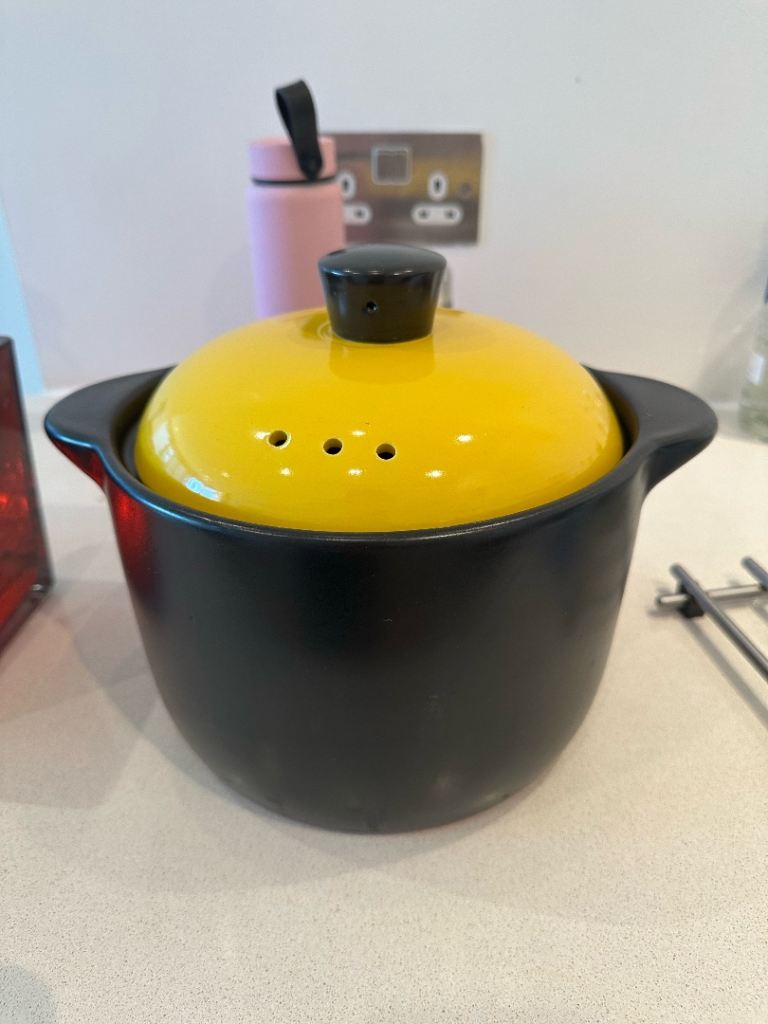 Black Ceramic Cooking Pot with Yellow Lid – Good Condition