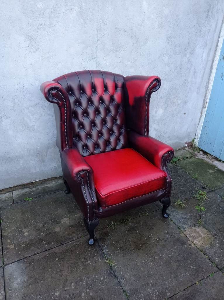A Red Leather Chesterfield Queen Ann/Wing ArmChair