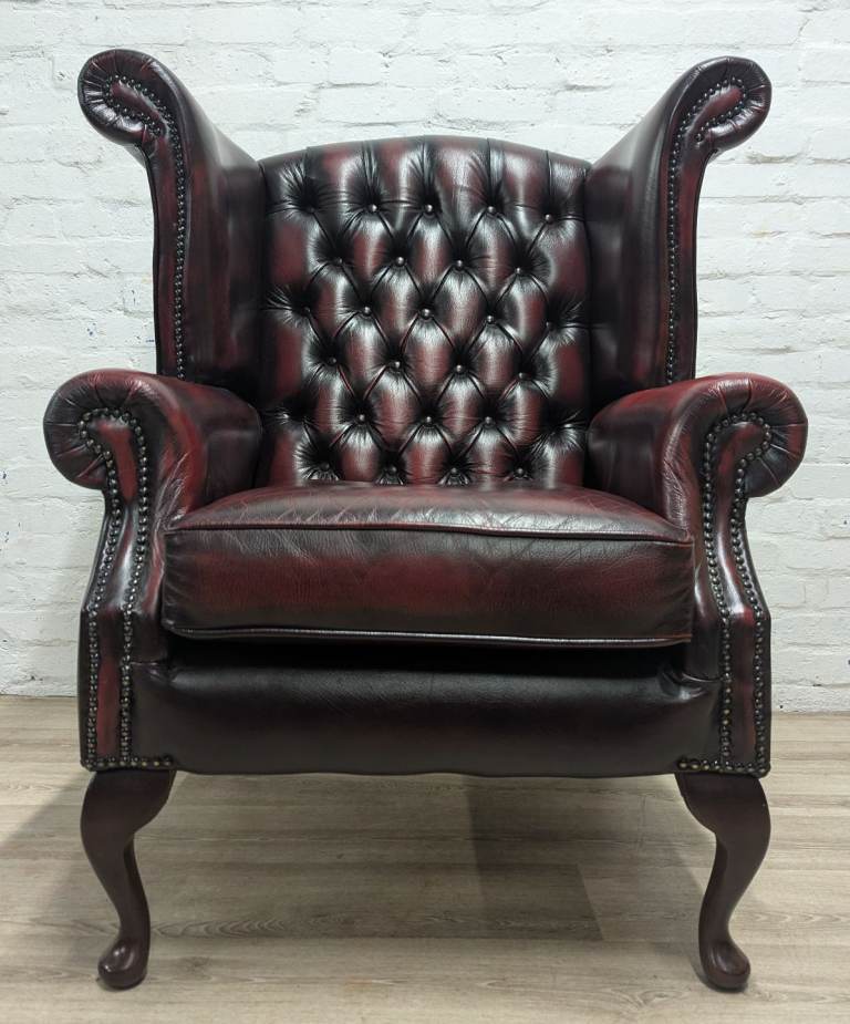 Chesterfield wing back armchair oxblood leather by Thomas Lloyd 