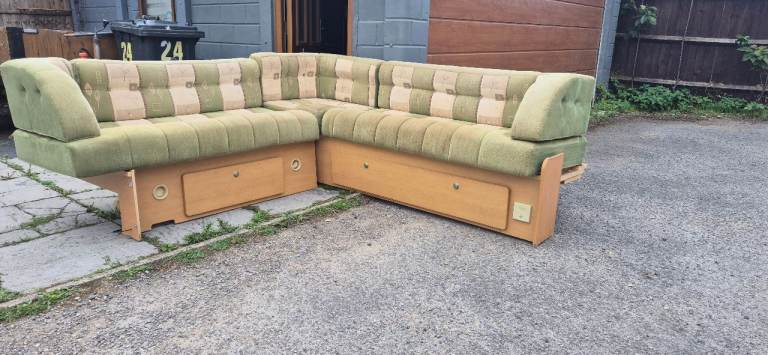 L - shape seats with cushions for van conversion.