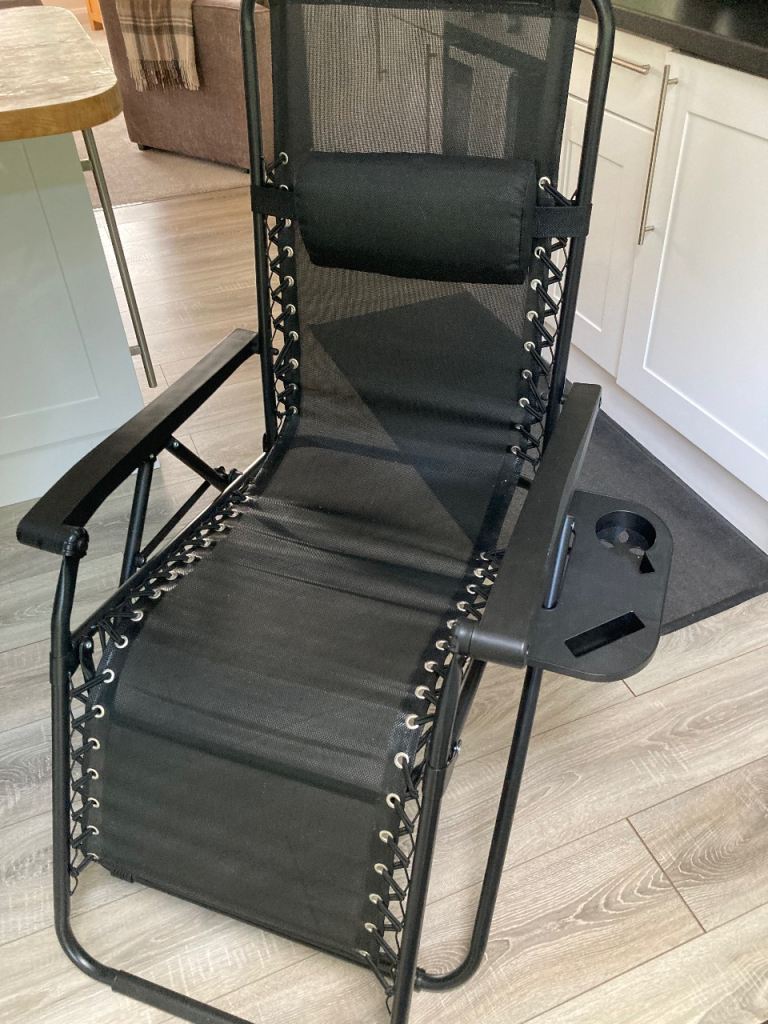 A zero gravity reclining garden chair in excellent condition
