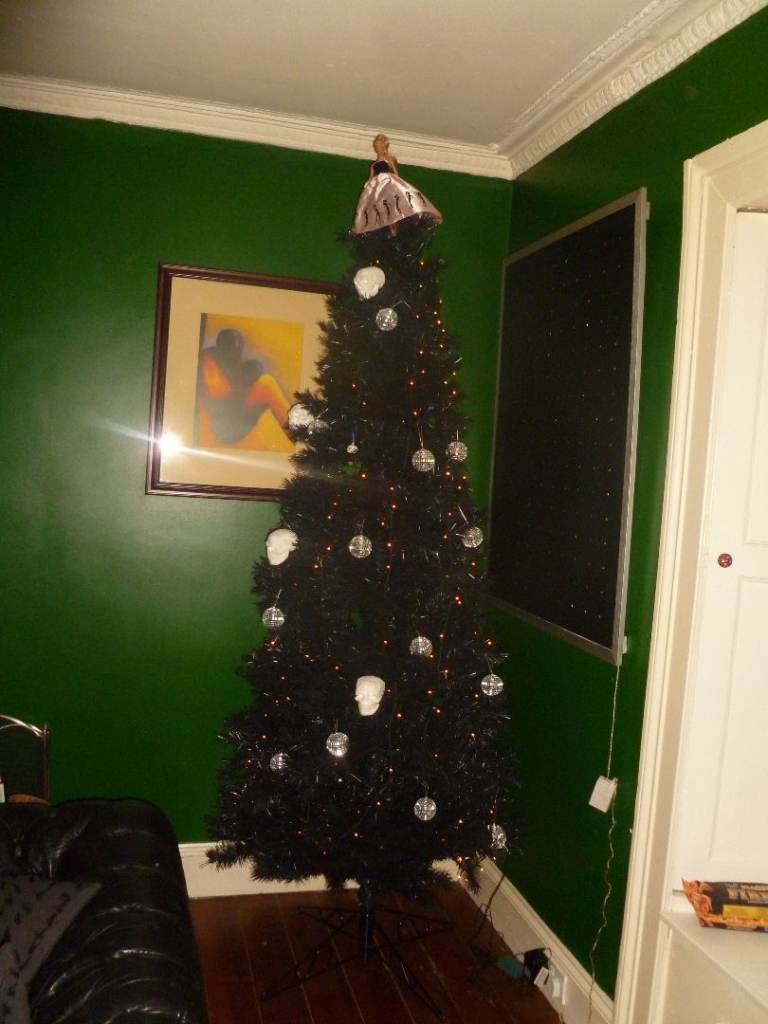 wicked 8 ft black christmas tree  with all you need. 