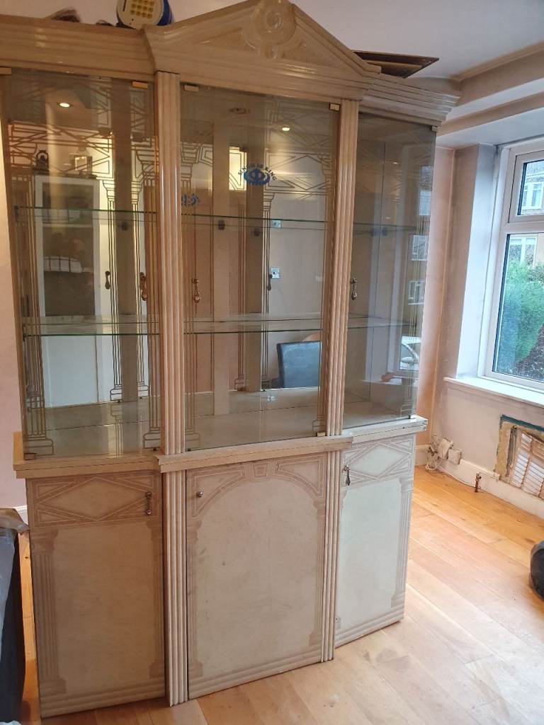 image for Marble Cabinet with glass doors.