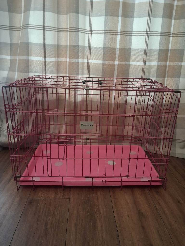 Pink dog crate 