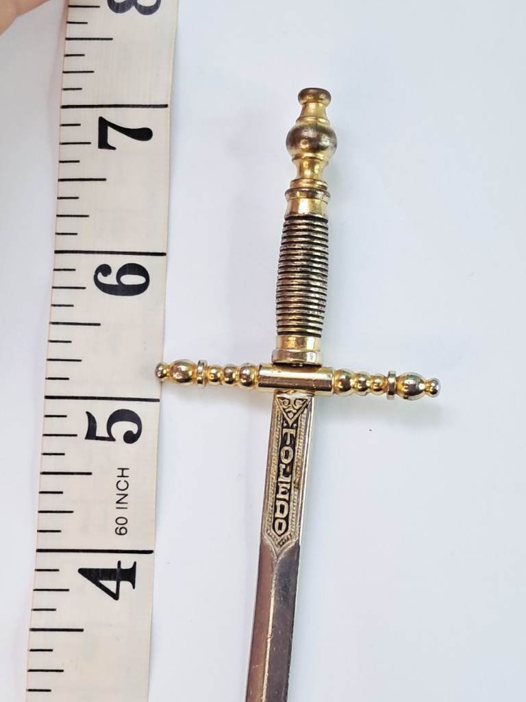 Vintage style miniature s..ord letter opener.