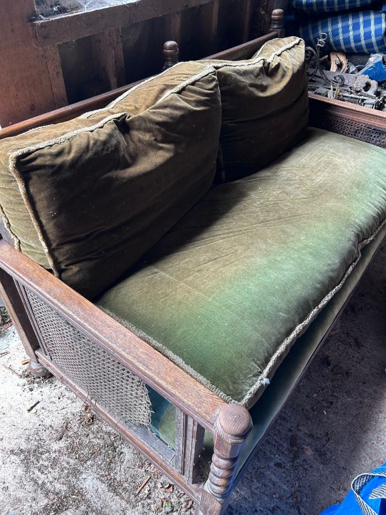 Antique hardwood and velvet sofa
