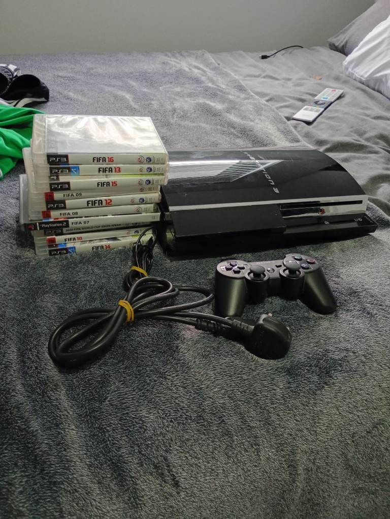 PlayStation 3 (PS3) Console with Controller and Games