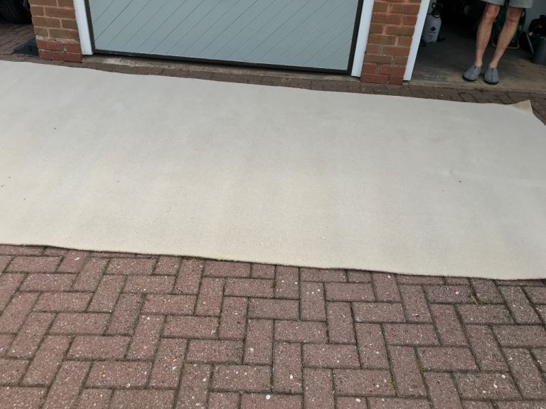 Beige colour 80/20 hessian backed carpet . Penthouse.