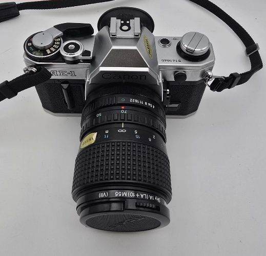 Vintage Canon AE-1 SLR Film Camera with RMC Tokin 35-70mm 1:3.5 Lens
