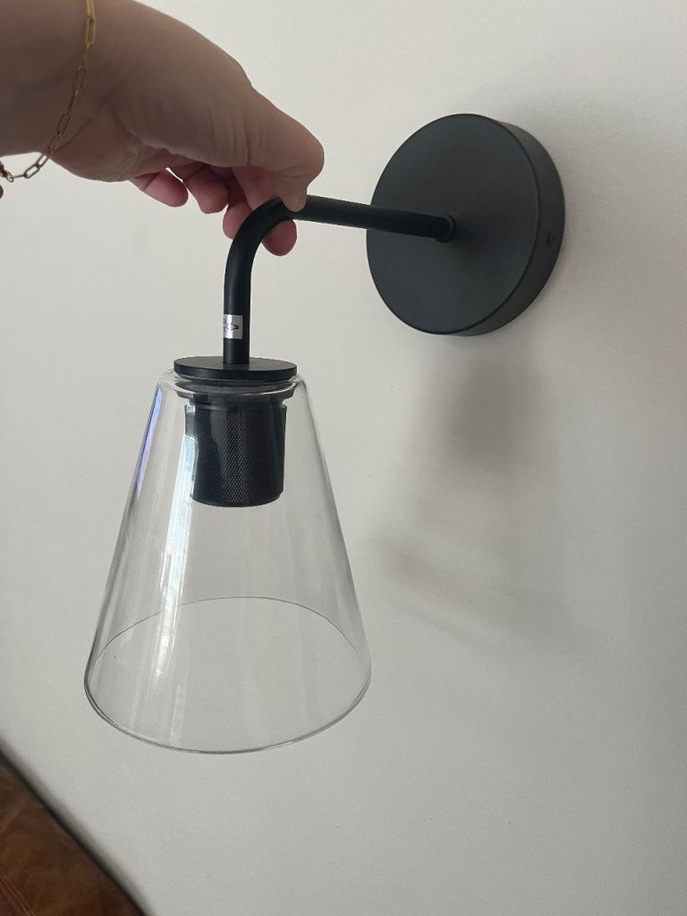 Modern Black Wall Sconce with Clear Glass Shade