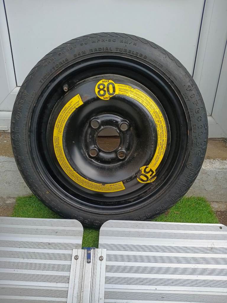 Space saver spare wheel measures 15 to 16 inch rim