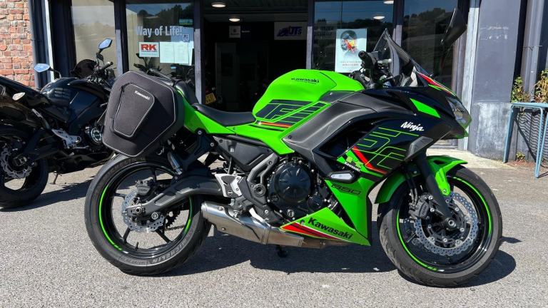 2024 KAWASAKI Ninja 650 in green.