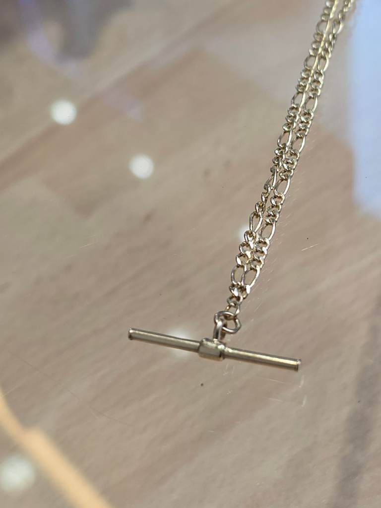 9CT GOLD 18" FIGARO CHAIN WITH T-BAR