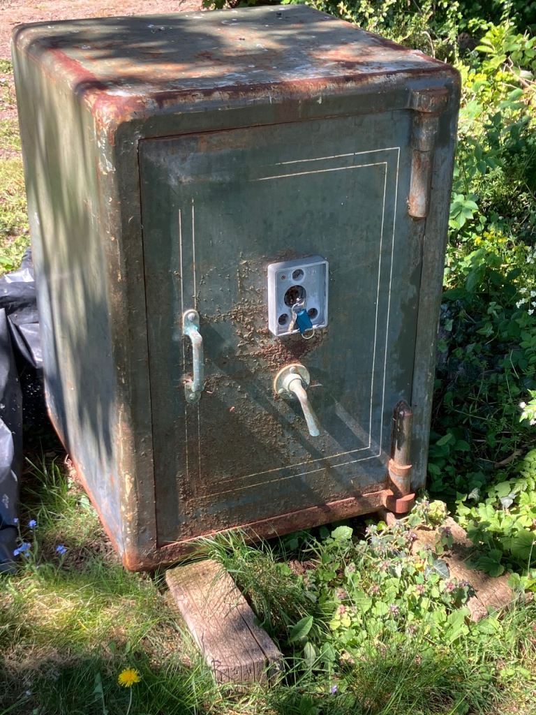 Antique steel safe with key