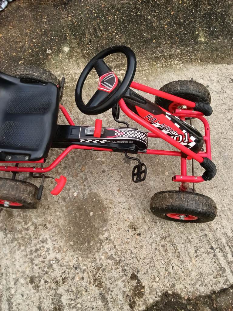 Childs pedal car forward and reverse