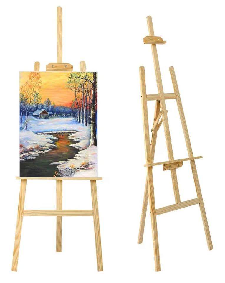 Easel + paint and brushes