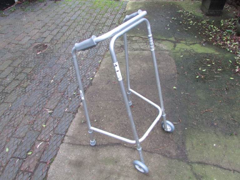 Mobility Walker.. Lightweight Adjustable Height Frame. Front Wheels.