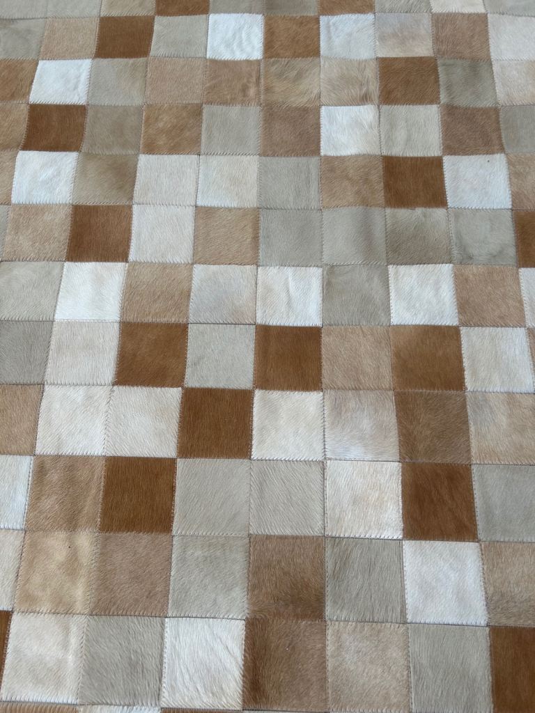 Cowhide patchwork rug. 200 x140 cm. Excellent.  Unused condition.