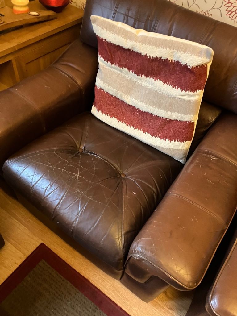 Brown leather suite. Couch and 2 single seats