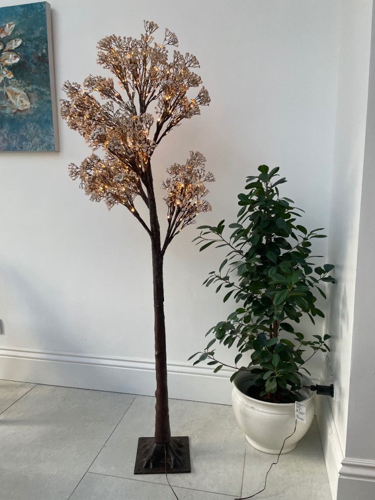 Cox and Cox 180m high faux Christmas tree with lights