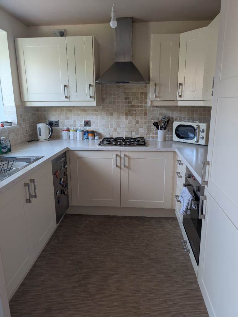 Used IKEA cream kitchen with appliances 