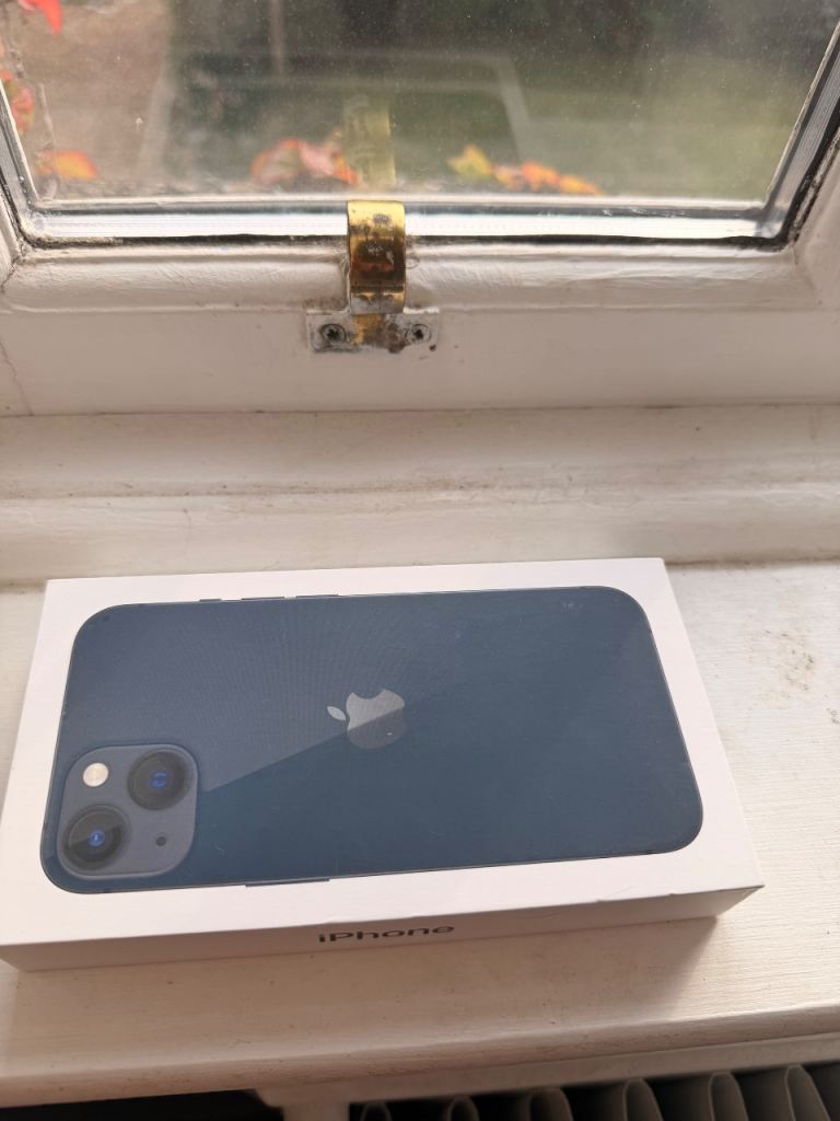 Brand new never opened IPhone 13 midnight blue 