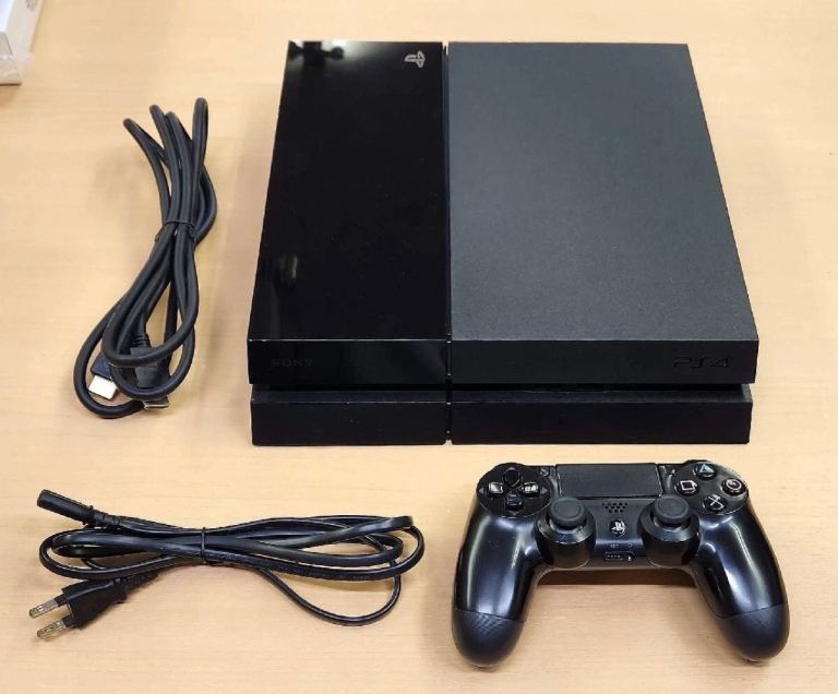 Sony PlayStation 4 Console with Controller and Cables